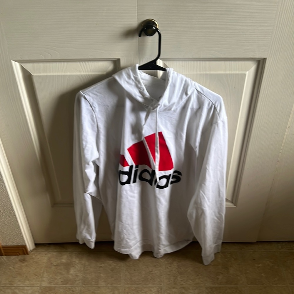 Large Tshirt hoodie. Does show some signs of wearing.